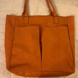 Newman Marcus orange pleather Tote bag.